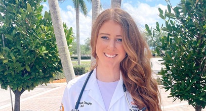 Physician Assistant Mackenzie Doughty in her whitecoat