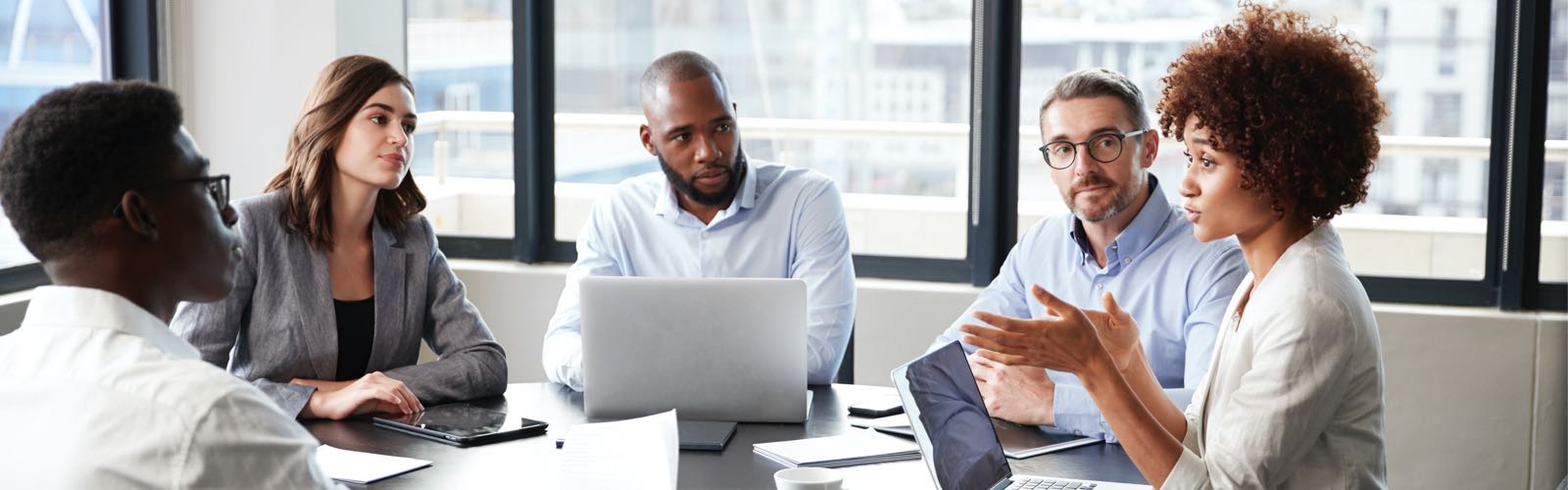 Group of criminal justice professionals in office meeting